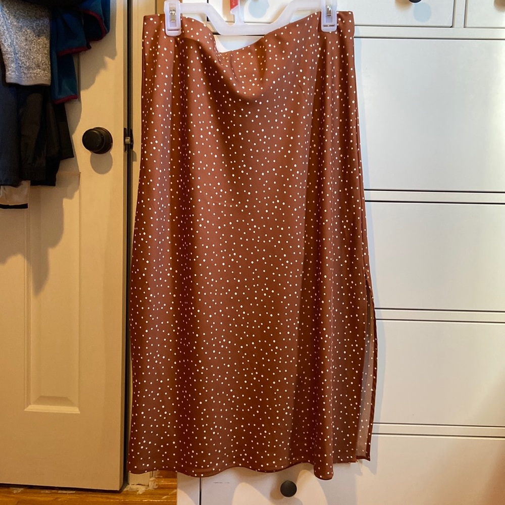 Brand new, never worn dark orange/tan polka dot silk midi skirt